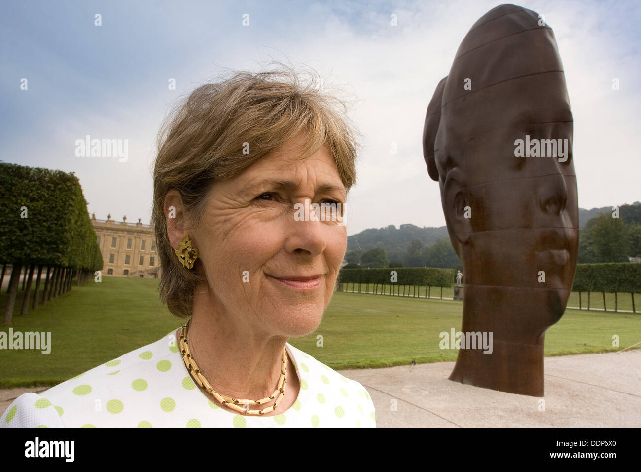 Chatsworth House, Derbyshire, UK. 5th September 2013. Press Call: The Duchess of Devonshire with Jaume Plensa's Marianna, one of 20 monumental sculptures temporarily installed in the grounds of Chatsworth House for Sotheby's Beyond Limits monumental sculpture exhibition 2013. @Matthew Taylor/Alamy Live News Stock Photo