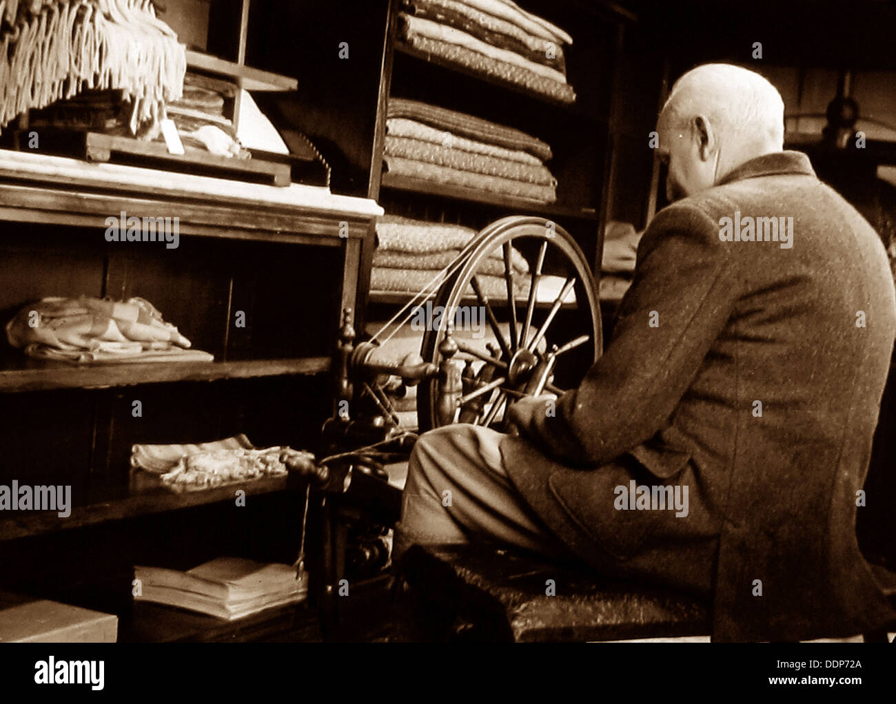 Hand loom weaver / spinner early 1900s Stock Photo