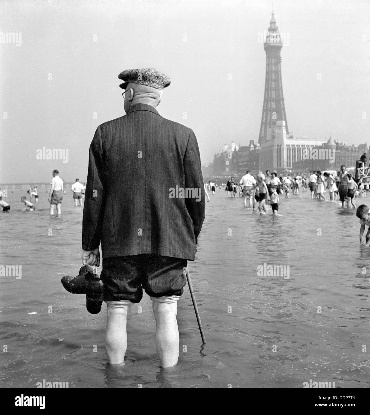 An elderly man paddling in the sea, Blackpool, c1946-c1955. Artist: John Gay Stock Photo