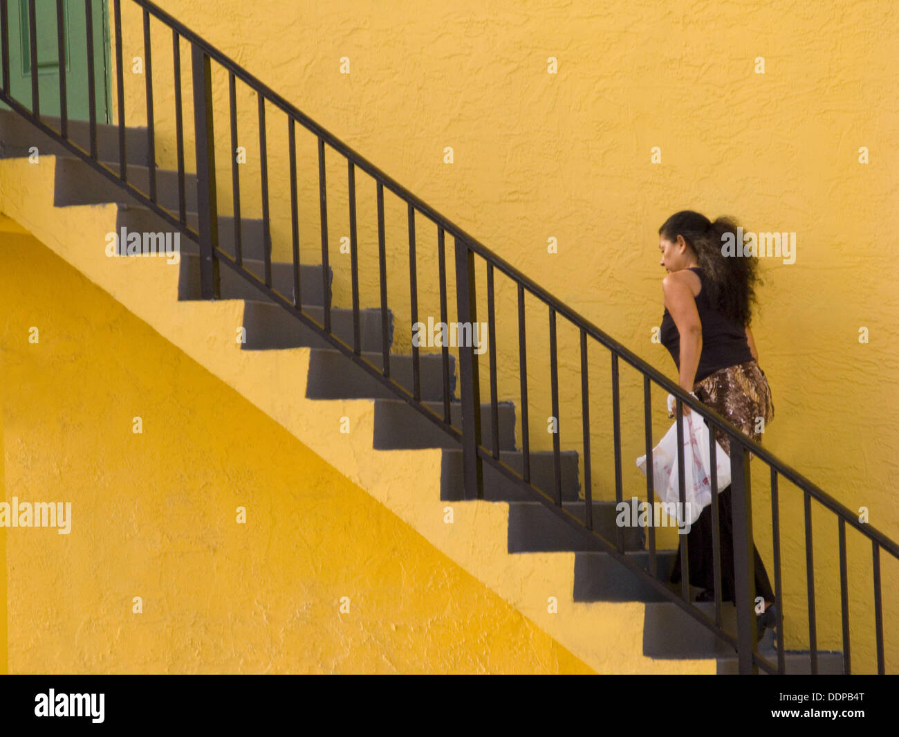 woman-walking-up-stairs-stock-photo-alamy