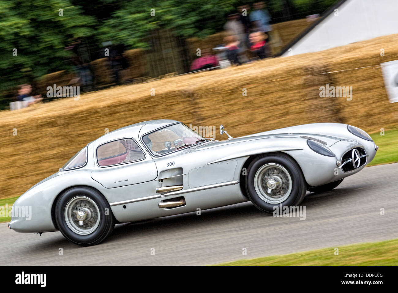 1955 Mercedes-Benz 300SLR Uhlenhaut Coupe at the 2013 Goodwood Festival of Speed, Sussex, UK. Driver - Hans Hermann. Stock Photo