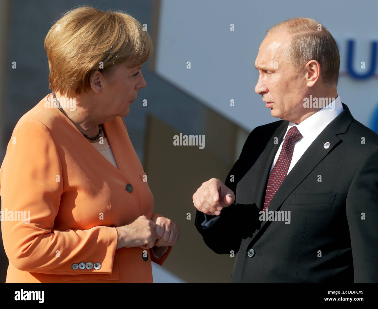 St. Petersburg, Russia. 05th Sep, 2013. Russian President Vladimir Putin welcomes German Chancellor Angela Merkel for the G20 summit at the Constantine Palace in St. Petersburg, Russia, 05 September 2013. The G20 summit takes place from 05 to 06 September. Photo: Kay Nietfeld/dpa/Alamy Live News Stock Photo