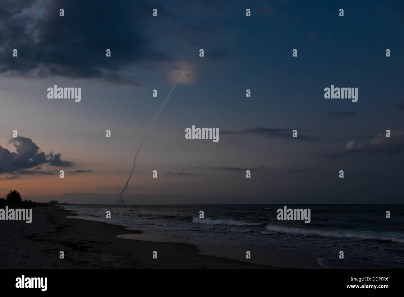 Delta IV rocket launch at dusk, taken from the beach in Cocoa Beach