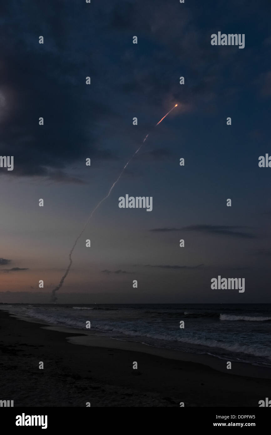 Delta IV rocket launch at dusk, taken from the beach in Cocoa Beach