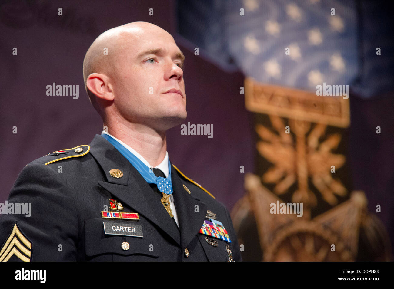 Pictured is the Medal of Honor Hall of Heroes Induction Ceremony in honor of U.S. Army Staff Sgt. Ty Michael Carter, in the Pentagon Auditorium, Aug. 27, 2013. Stock Photo