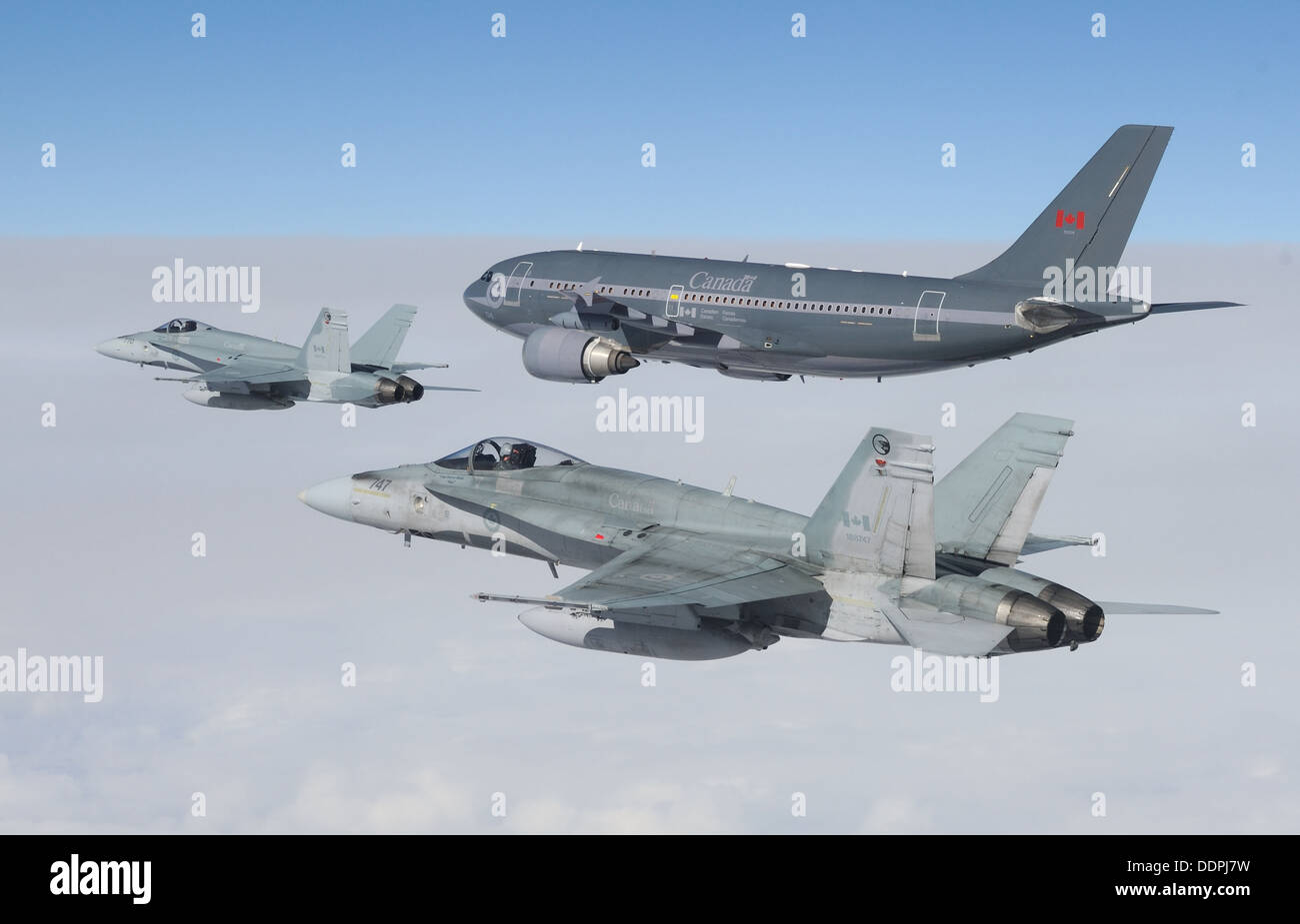 A CC-150 Polaris Airbus from 437 Squadron in Trenton prepares to provide air-to-air refueling to CF-18 Hornet fighter aircraft from 409 Squadron in Cold Lake, Alberta during Exercise VIGILANT EAGLE 13 on August 28, 2013 Stock Photo