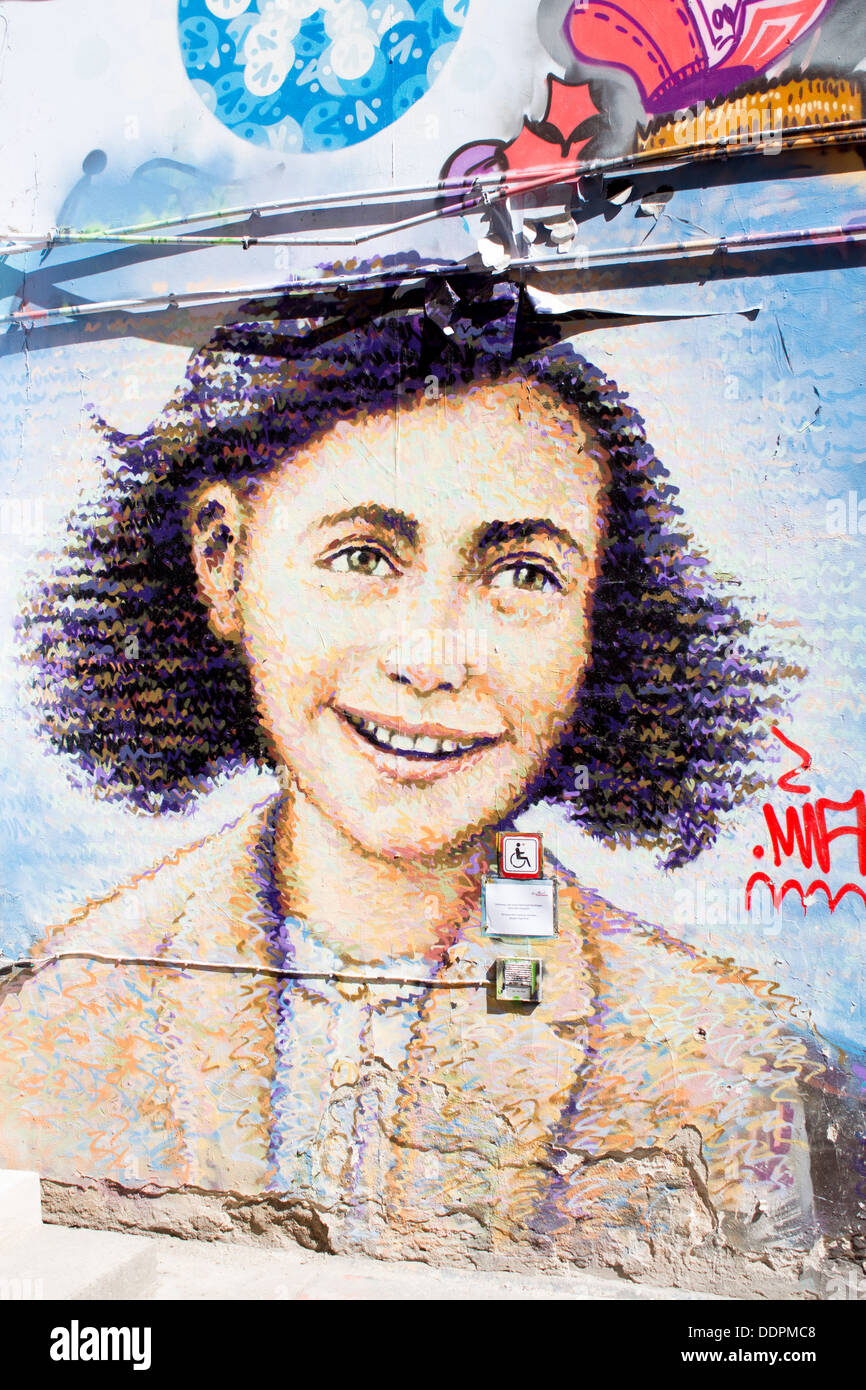 Anne Frank mural wall art artwork painting outside exhibition Berlin Germany Stock Photo