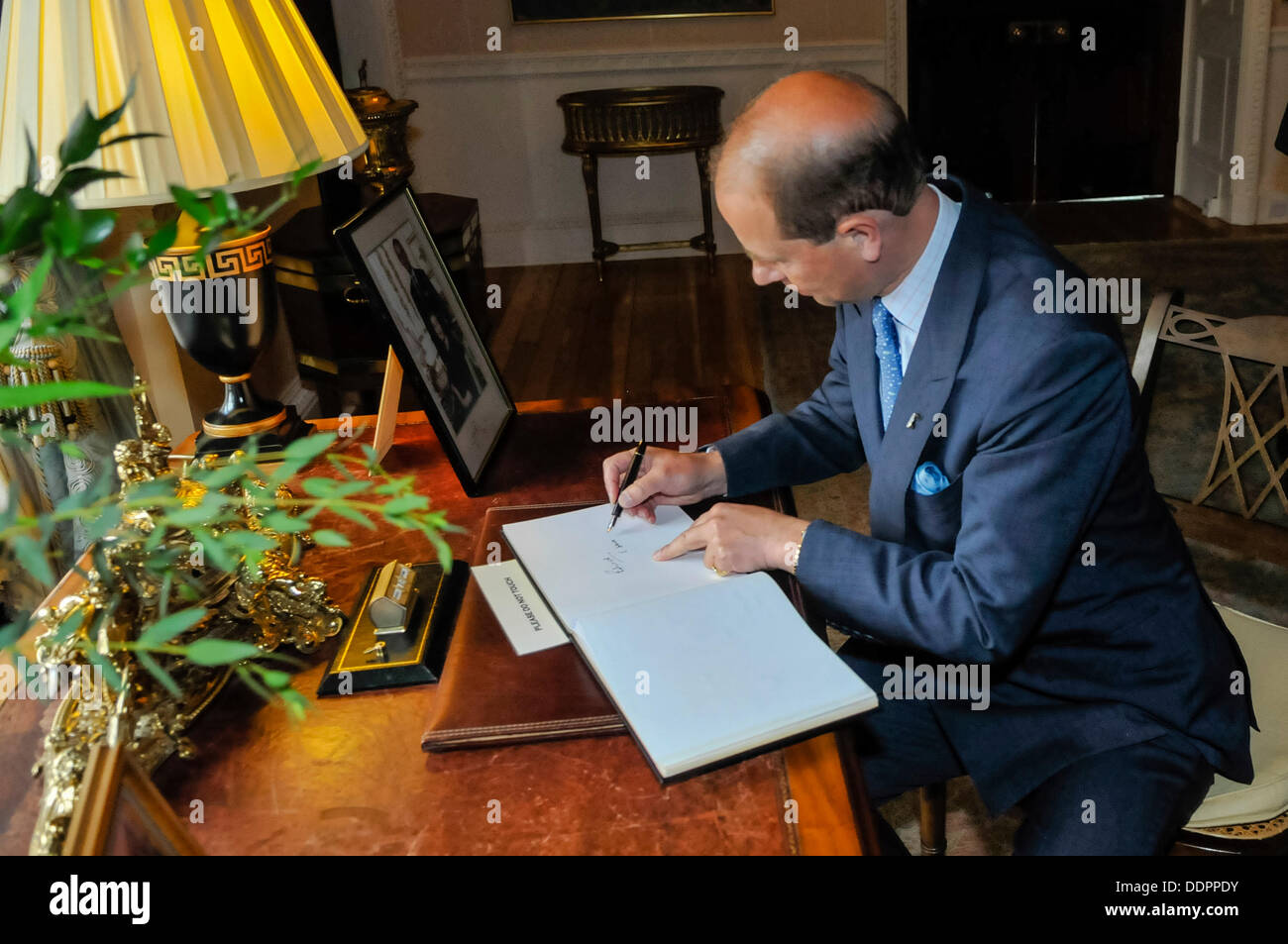 Hillsborough, Northern Ireland. 5th September 2013 - Prince Edward signs the guest book at Hillsborough Castle Credit:  Stephen Barnes/Alamy Live News Stock Photo