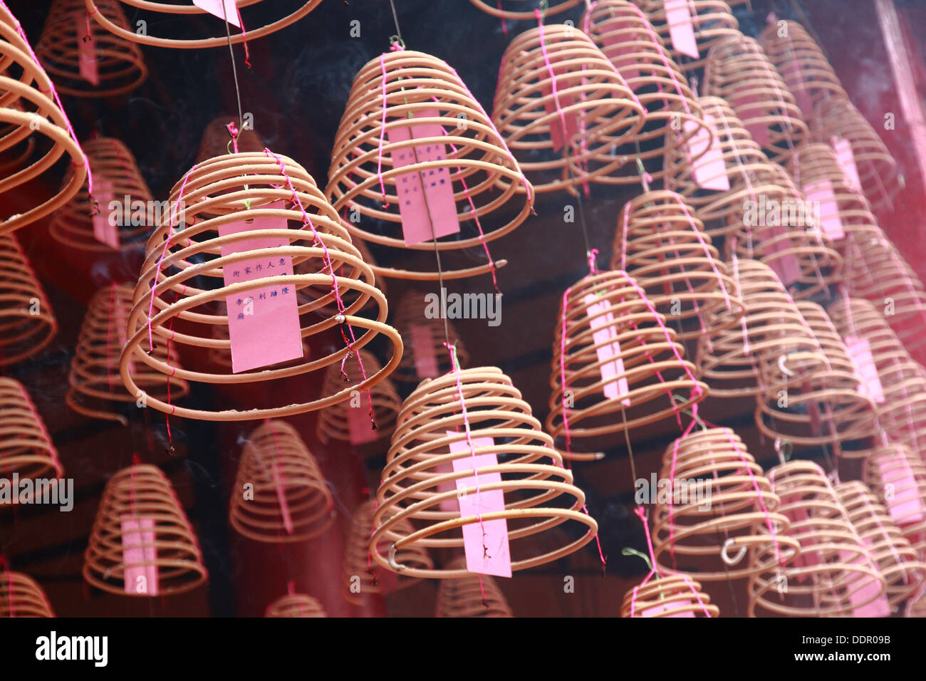 group of chinese joss sticks hang in temple Stock Photo Alamy