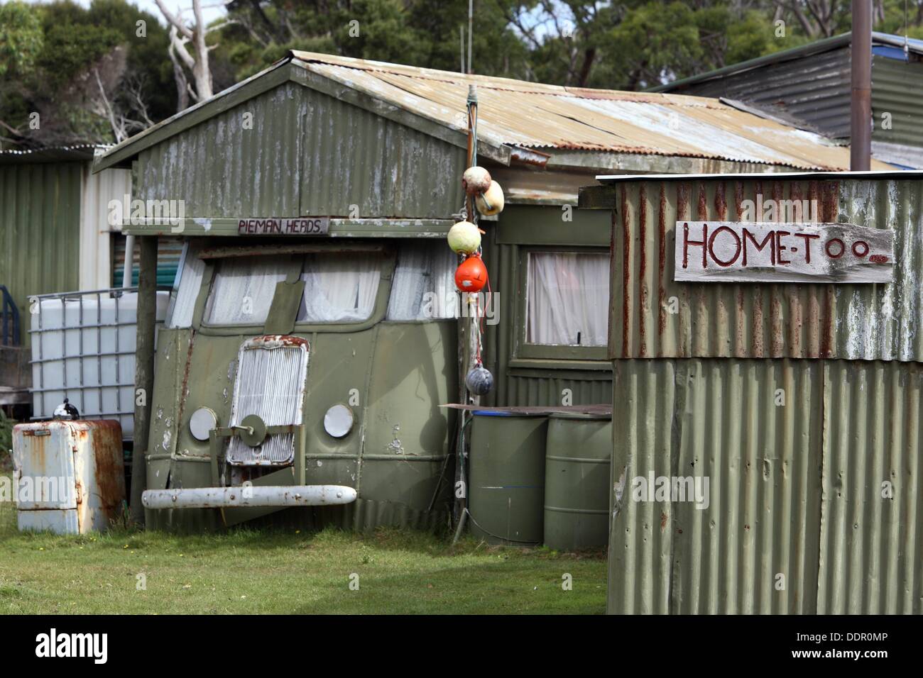 Beach shacks at Pieman Heads North West Tasmania, Australia Stock Photo