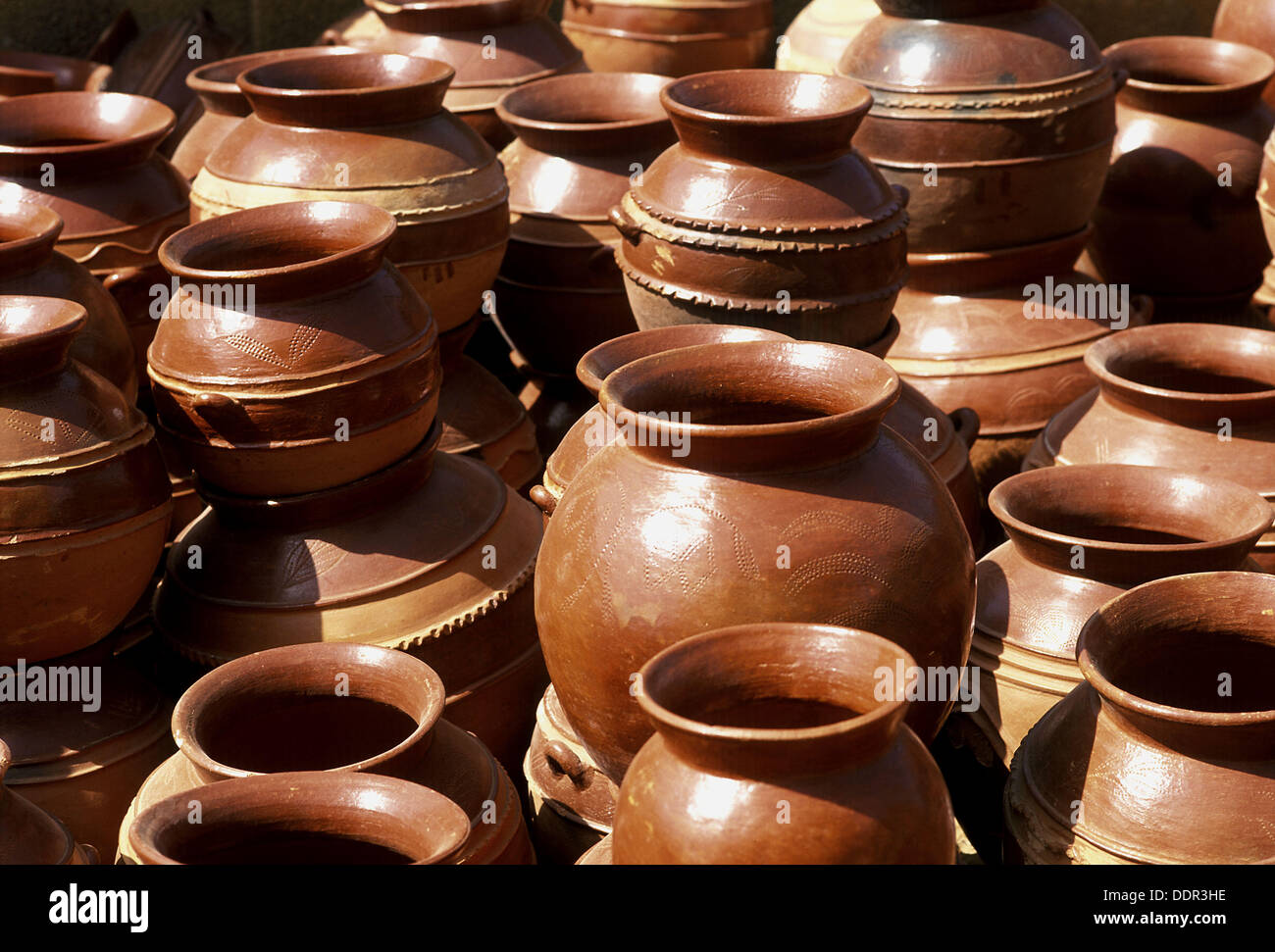 clay pot artisan Clay pots on artisan market. Ouagadougou. Burkina Faso. West clay pot artisan Clay pots on artisan market. Ouagadougou. Burkina Faso. West
