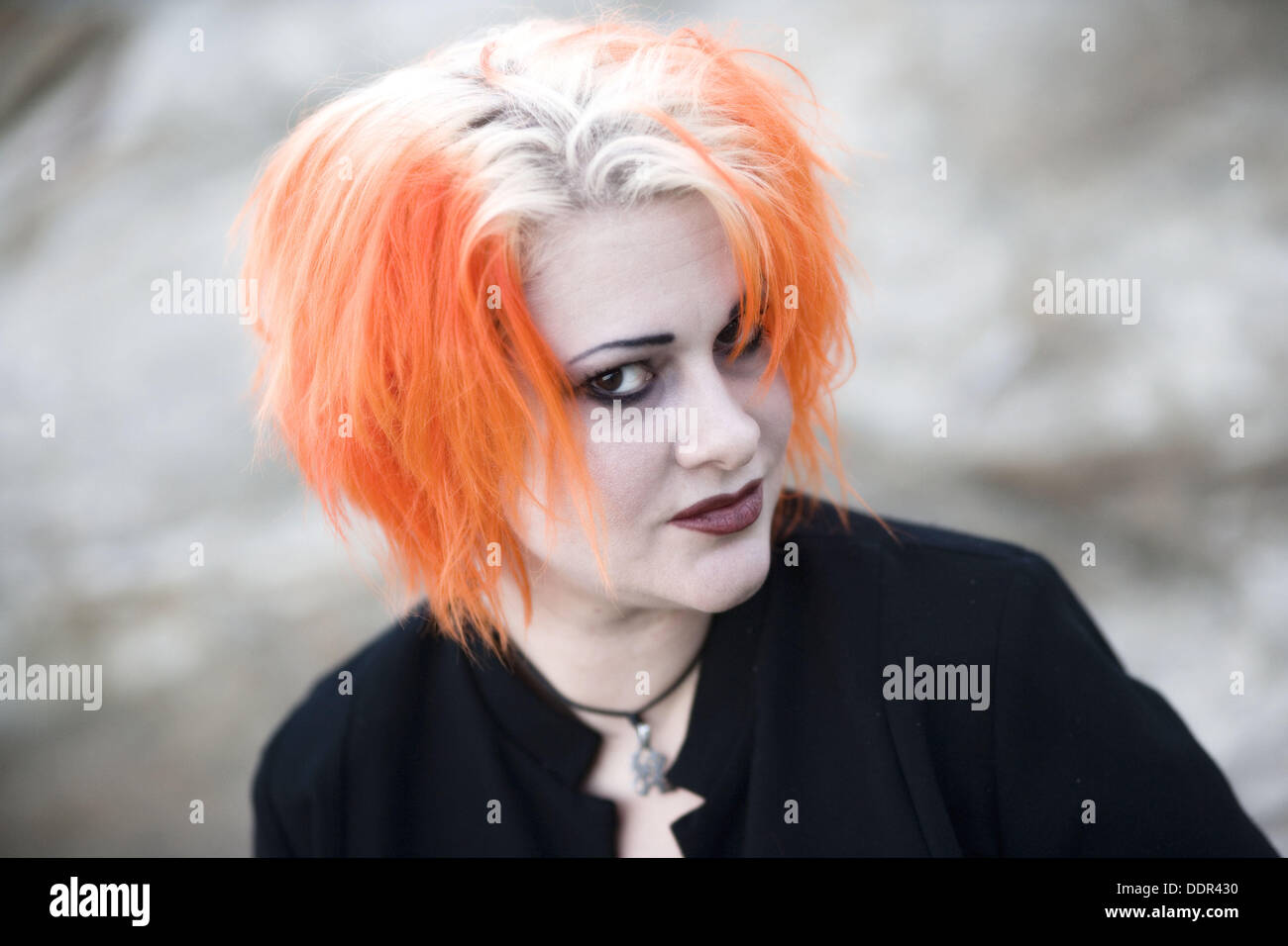 Middle aged woman dyed red hair hi-res stock photography and images - Alamy