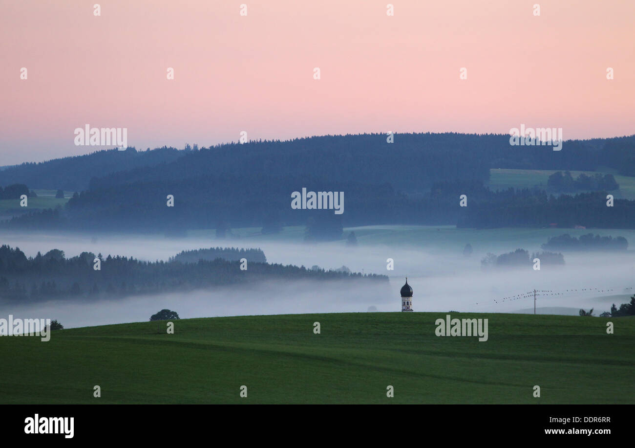 Bernbeuren, Germany. 06th Sep, 2013. Early morning fog is visible in the valleys of the prealpine lands near Bernbeuren, Germany, 06 September 2013. Photo: KARL-JOSEF HILDENBRAND/dpa/Alamy Live News Stock Photo