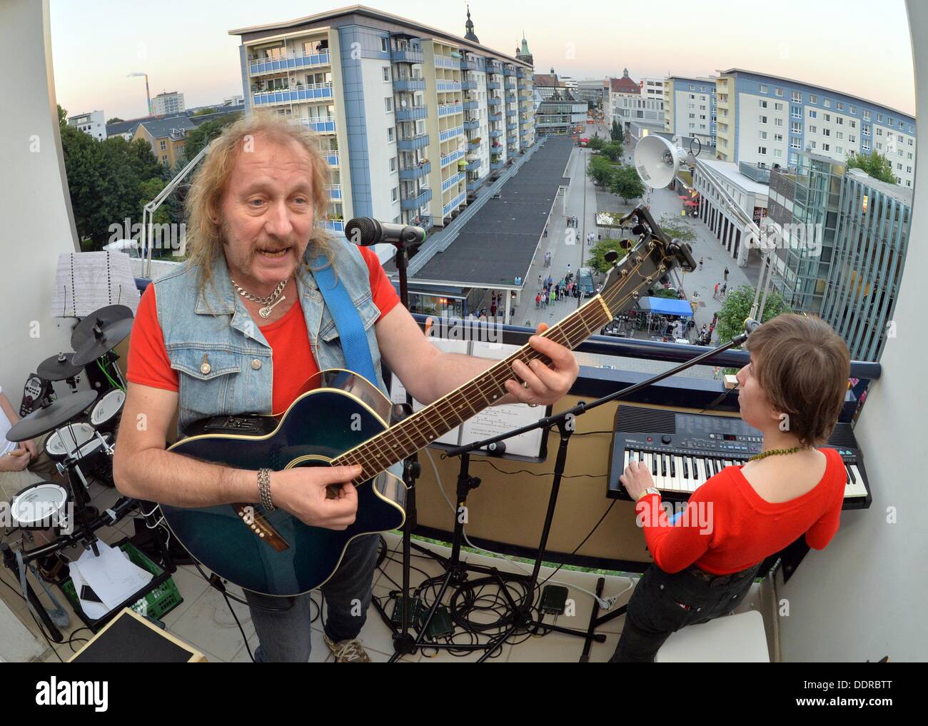 Chemnitz Germany 05th Sep 2013 Axel Klemm Of The Band Fehlstart Plays Music During The High Rise Ballet On A Balcony Of The 15 Storey High Punkt High Rise In The Centre Of Chemnitz Germany