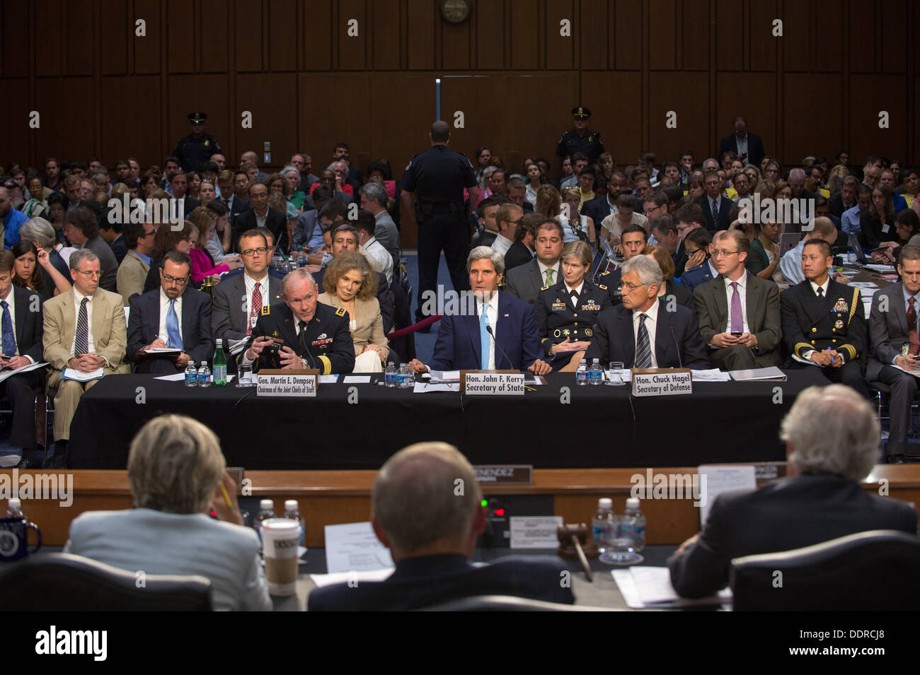 Chairman of the Joint Chiefs of Staff Martin E. Dempsey speaks along with Secretary of State John Kerry and Secretary of Defense Chuck Hagel during a Senate Foreign Relations Committee hearing at the Hart Senate Office building in Washington D.C. Sept. 3, Stock Photo