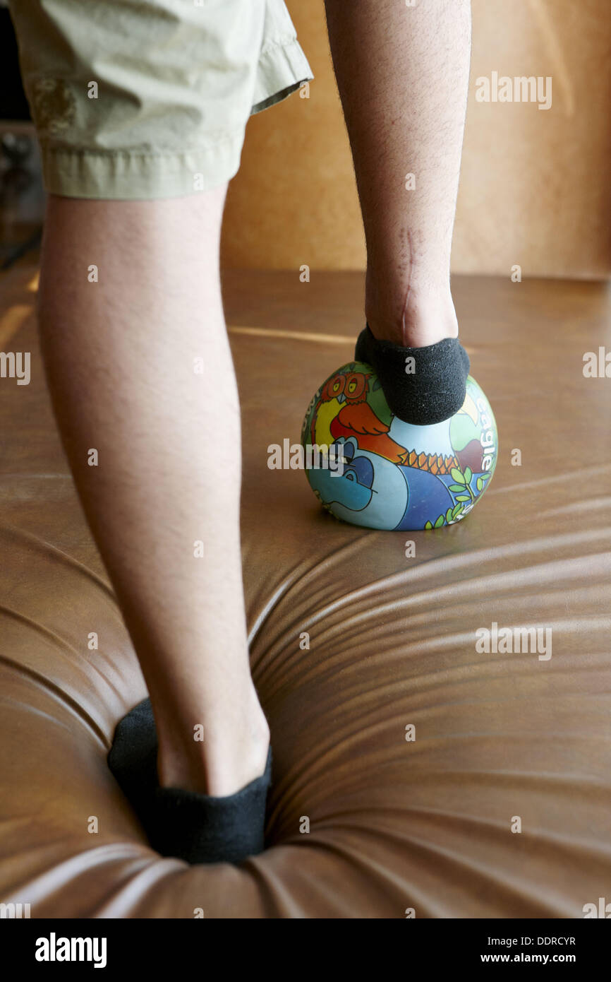 Rehabilitation, ball lower limb proprioceptive exercise, knee and