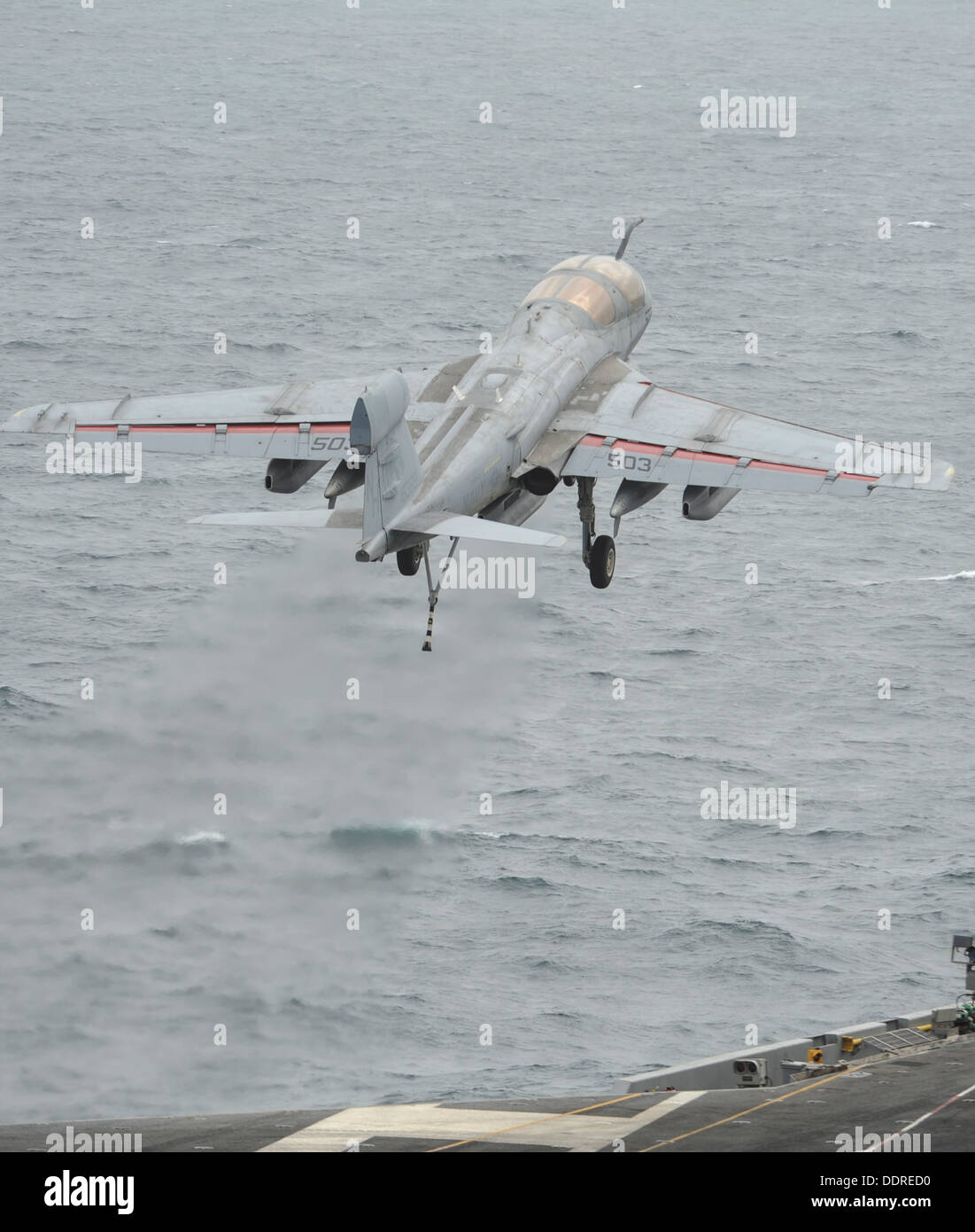 An EA-6B Prowler assigned to the Gray Wolves of Electronic Attack Squadron (VAQ) 142 launches off the flight deck of the aircraft carrier USS Nimitz (CVN 68). The Nimitz Carrier Strike Group is deployed to the U.S. 5th Fleet area of responsibility conduct Stock Photo
