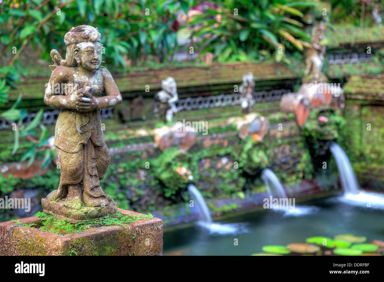 Indonesia, Bali, the Holy Springs at Pura Gunung Kawi Sebatu Temple Stock Photo