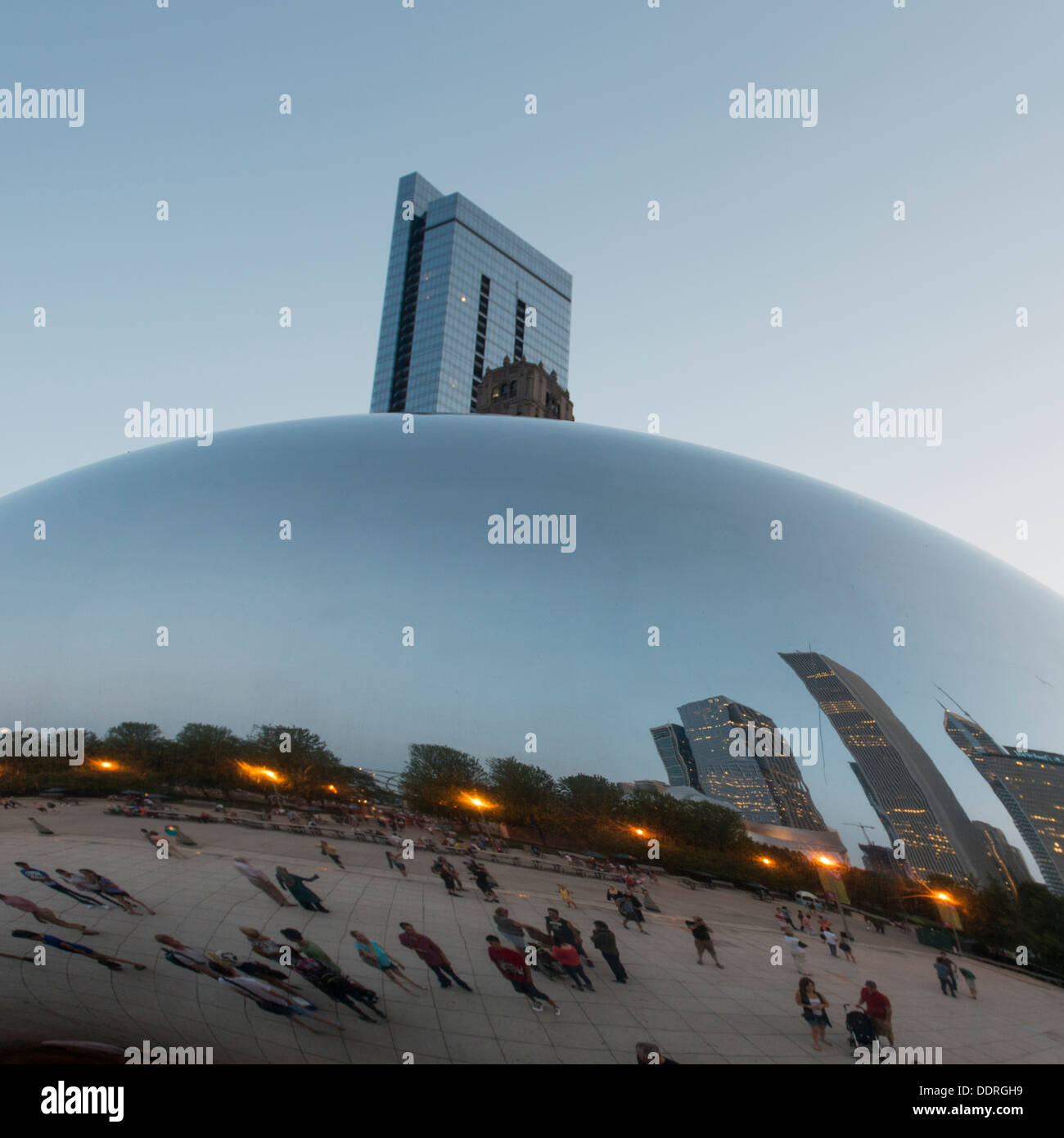 Reflection of buildings on Cloud Gate sculpture, Millennium Park ...