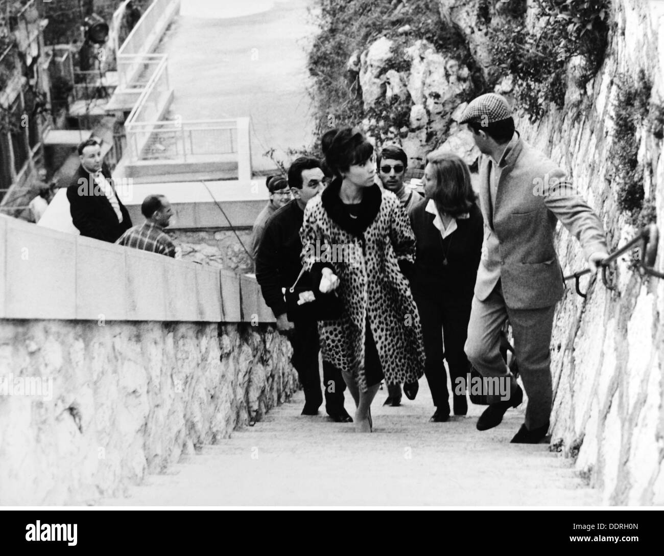 Belmondo, Jean-Paul, * 9.4.1933, French actor, half length, with first wife Renee 'Elodie' Constantin, Villefranche-sur-Mer, March 1963, Stock Photo