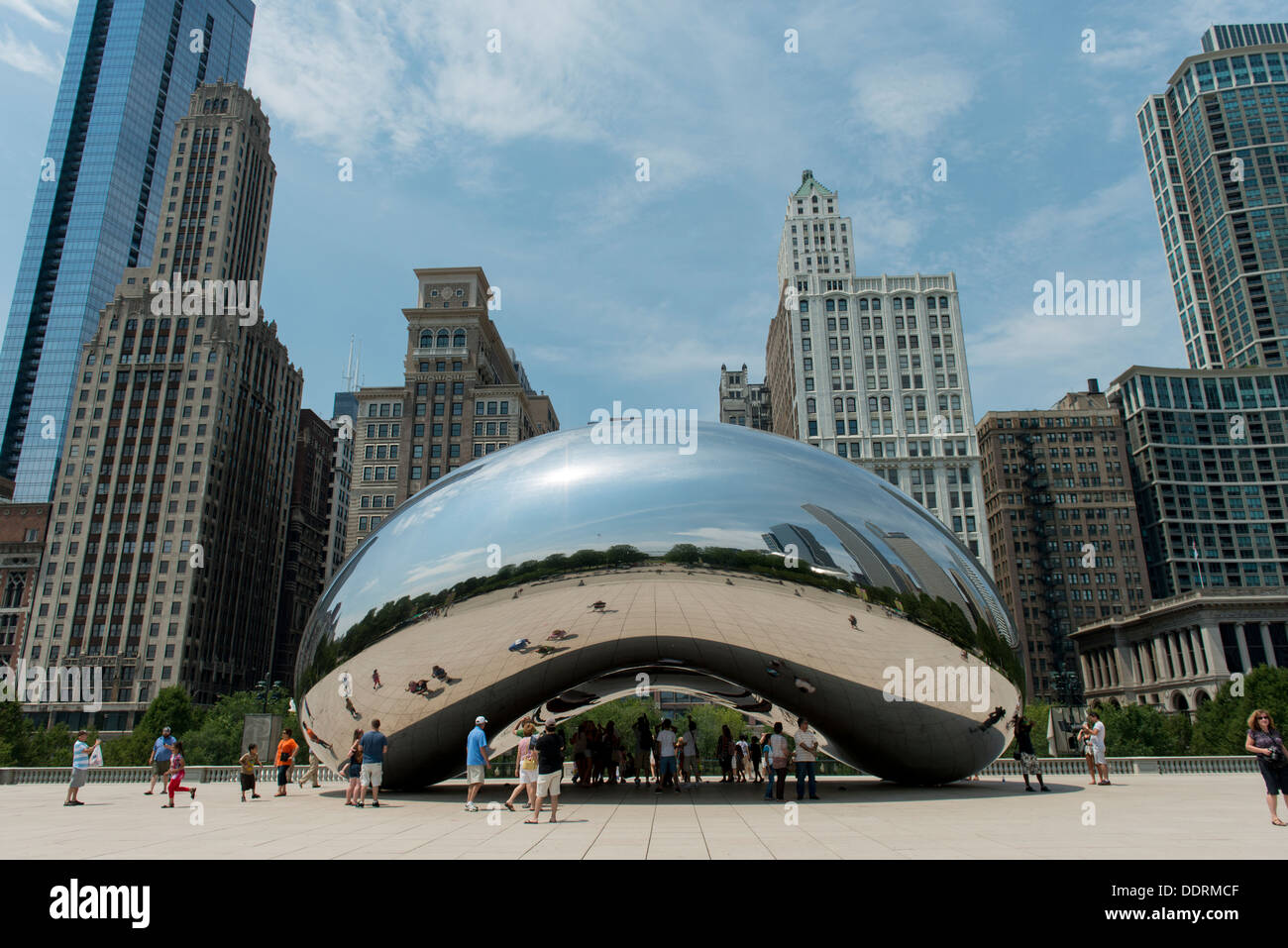 Reflection of buildings on Cloud Gate sculpture, Millennium Park ...