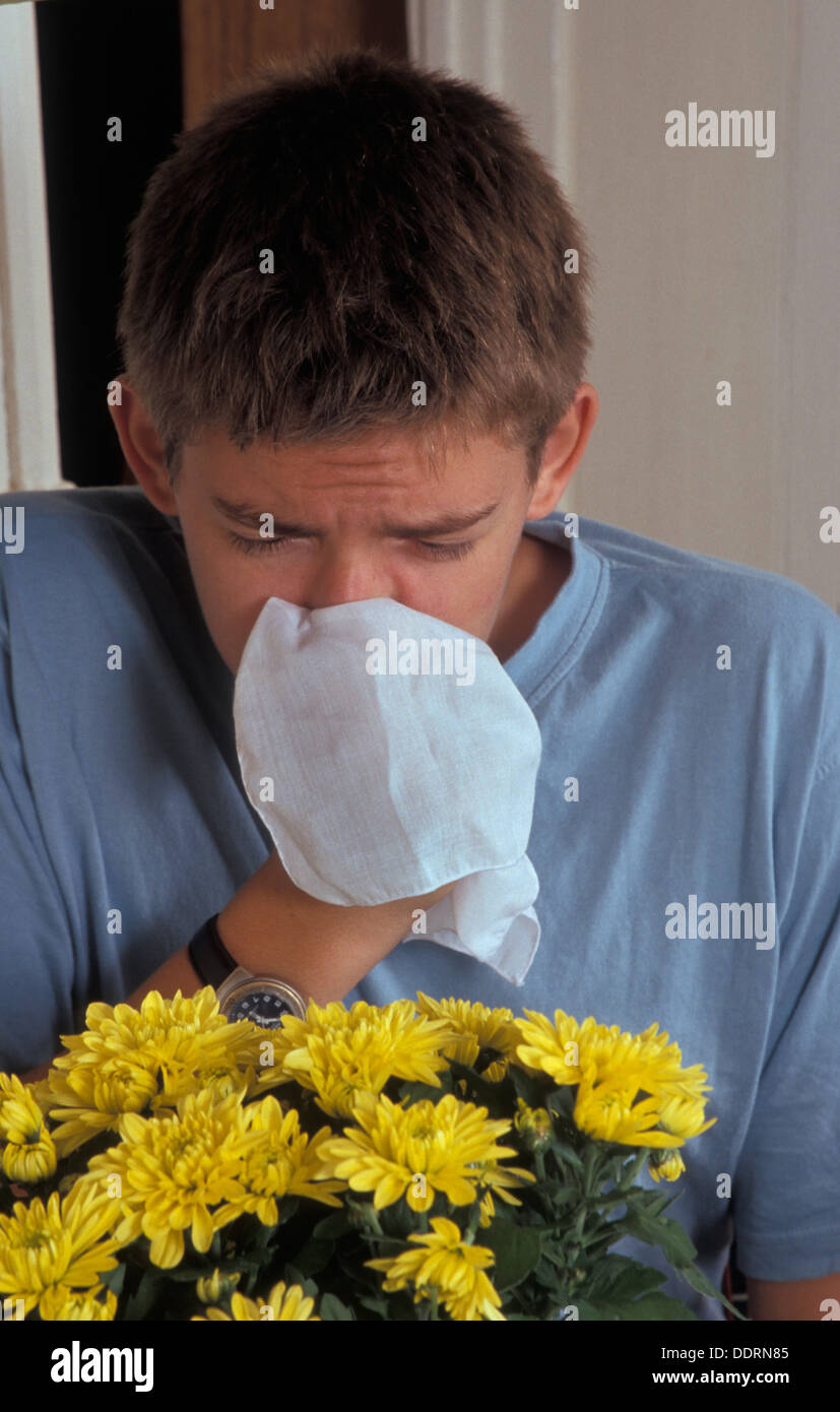 teenage-boy-allergic-to-flowers-stock-photo-alamy