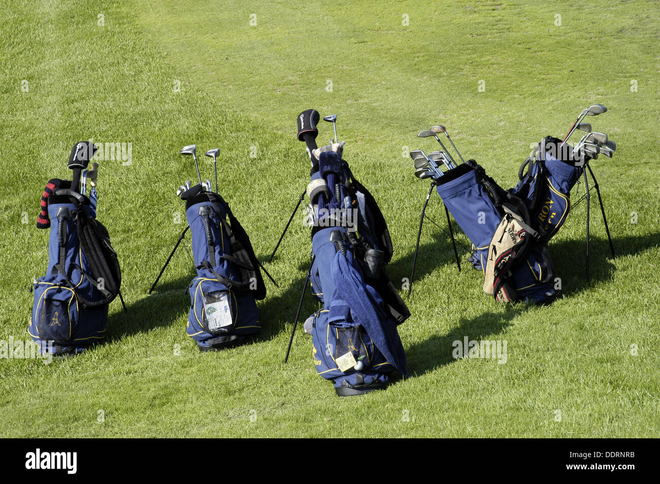 Golf clubs and bags Stock Photo Alamy