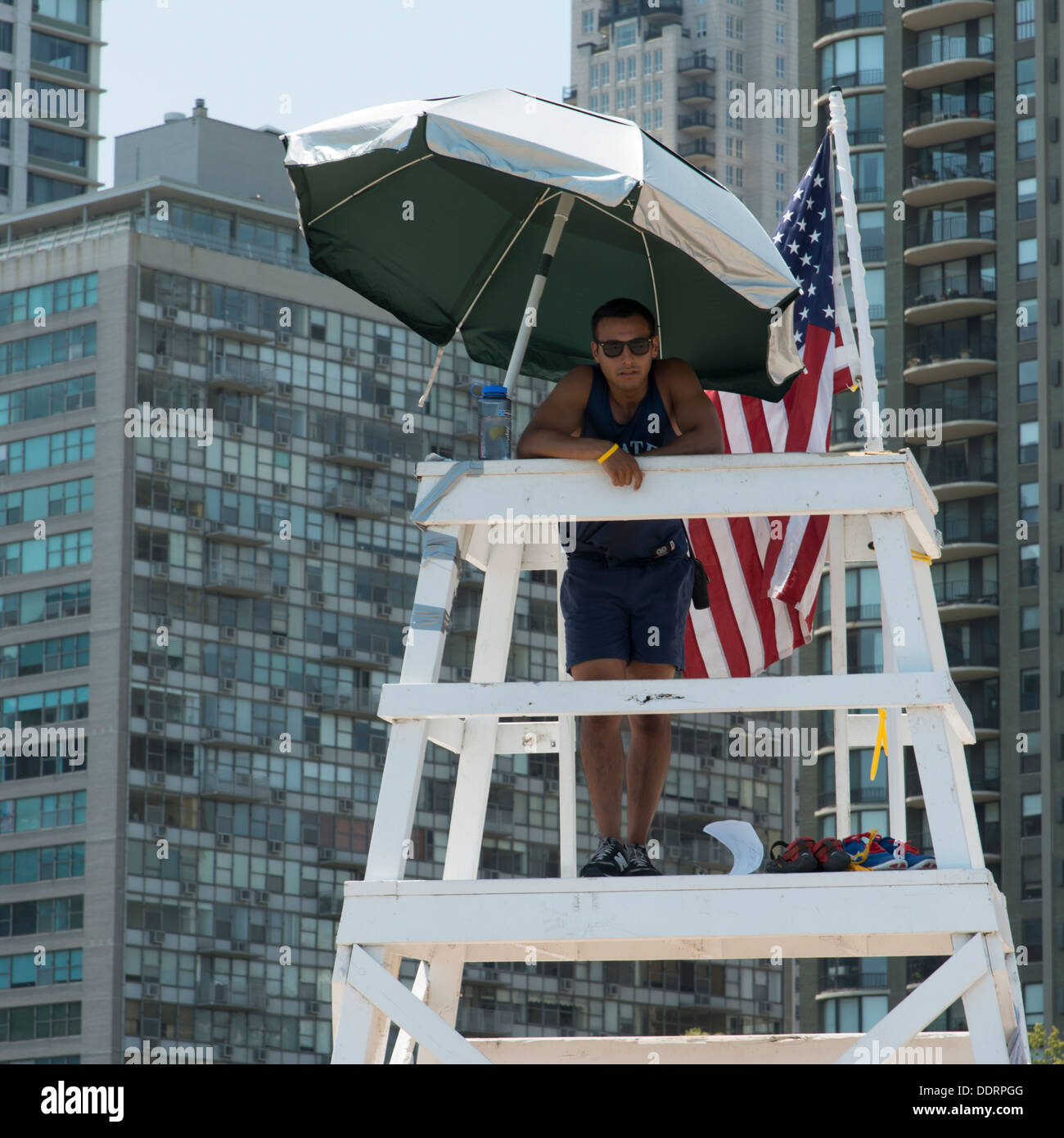 Lifeguard standing on a lifeguard's tower, Chicago, Cook County