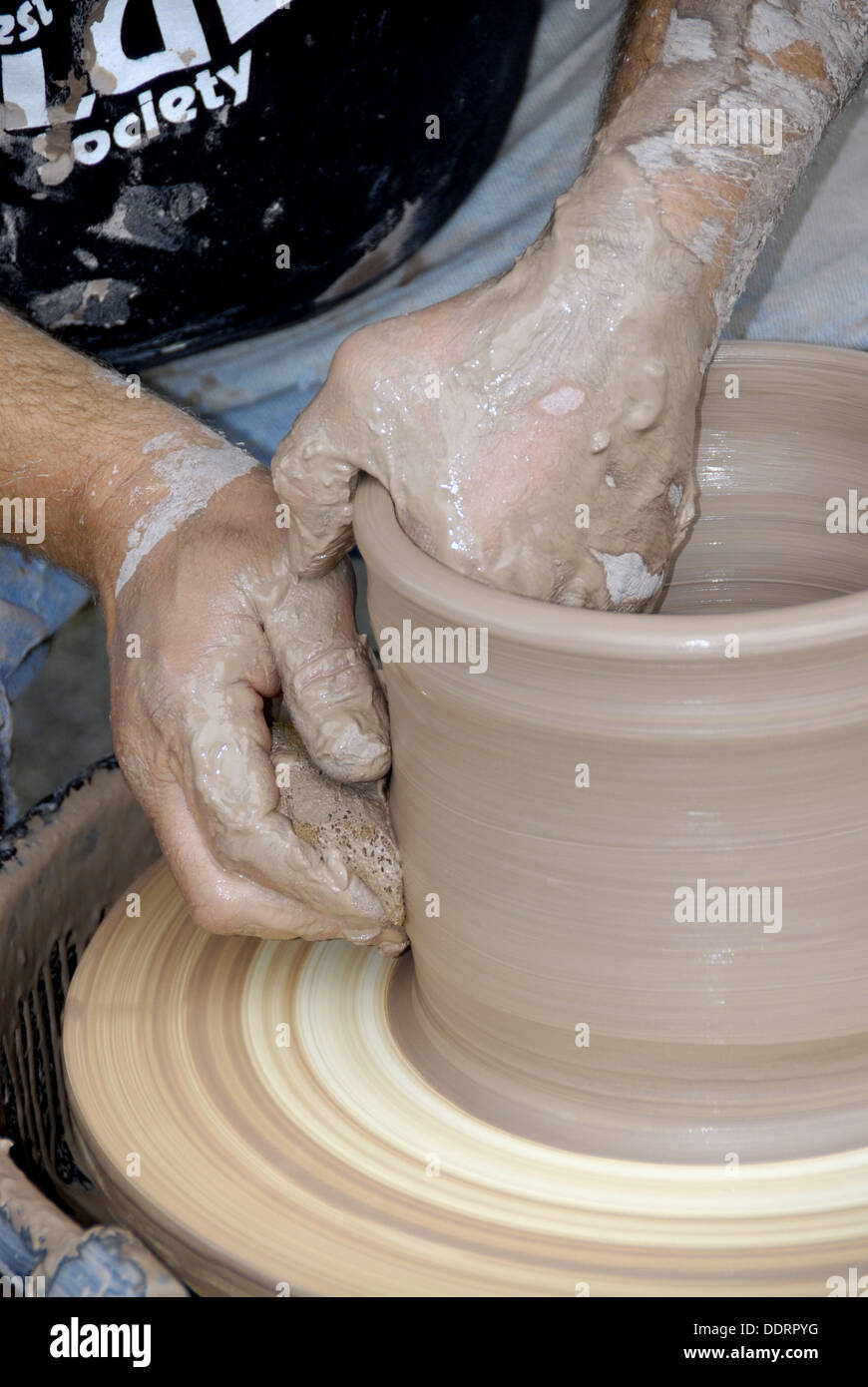 Pottery artist making a clay vase Stock Photo Alamy