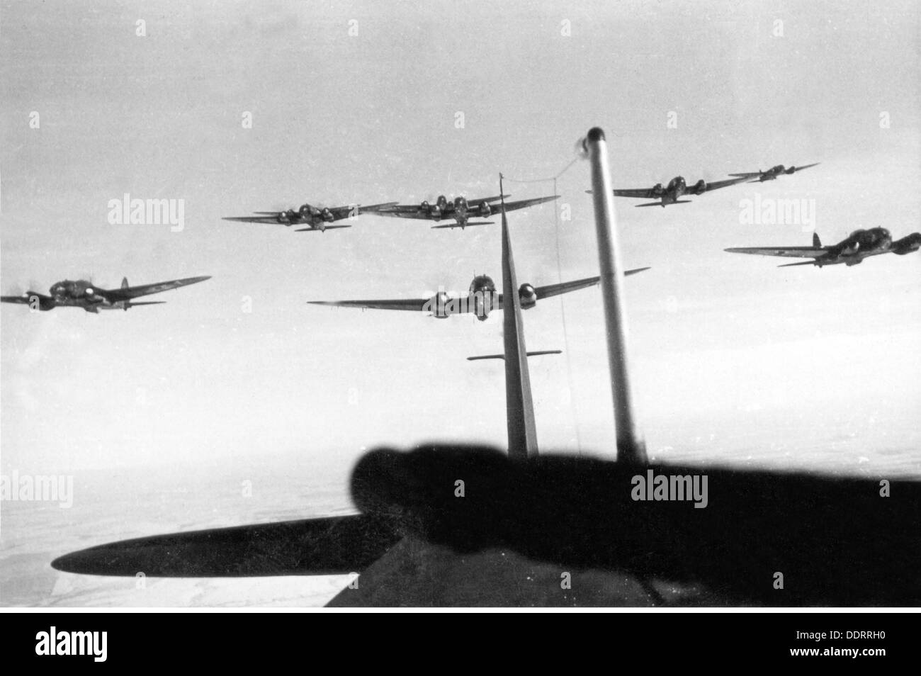Second World War / WWII, aerial warfare, England, approaching German bombers Heinkel He 111, summer 1940, Battle for Britain, air raid, air attack, air raids, raid, raids, Luftwaffe (German Air Force), Wehrmacht, armed forces, aeroplane, airplane, plane, airplanes, aeroplanes, planes, aircraft, Germany, German Reich, Third Reich, Great Britain, flying, sky, 1940s, 40s, 20th century, second, 2nd, world war, world wars, approach, approaches, bomber, bombers, historic, historical, Additional-Rights-Clearences-Not Available Stock Photo