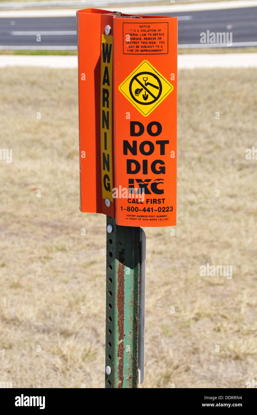 Utility warning marker for digging Stock Photo - Alamy