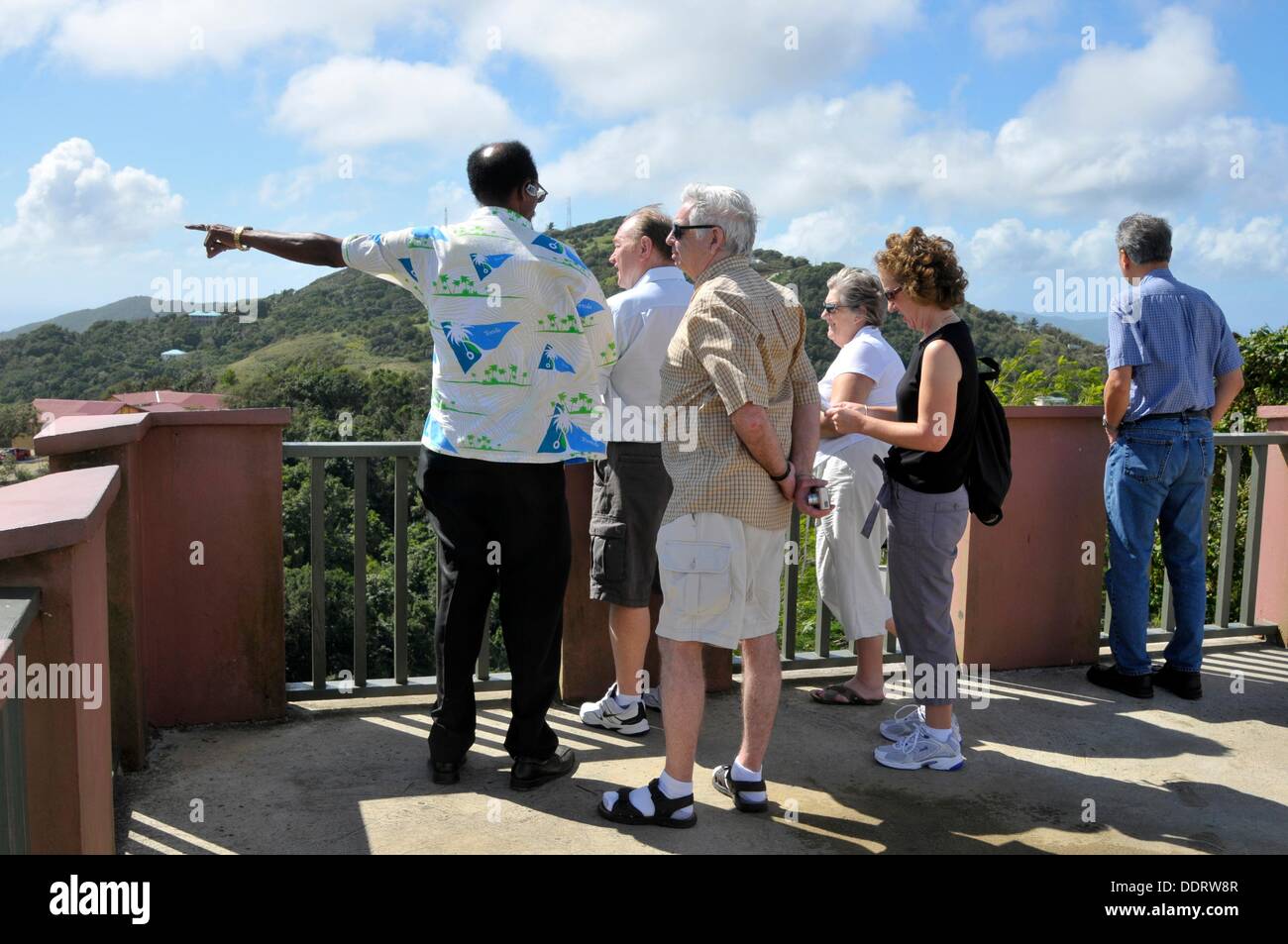Tour Guide Pointing to Other Islands Tortola BVI Caribbean Cruise Stock