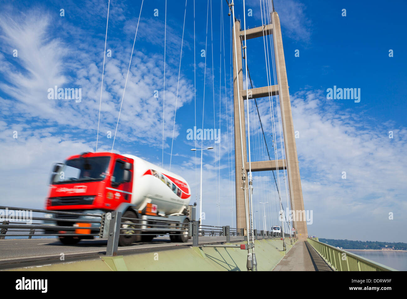 Lorry driving across the Humber bridge over river Humber Humberside East England UK GB EU Europe Stock Photo