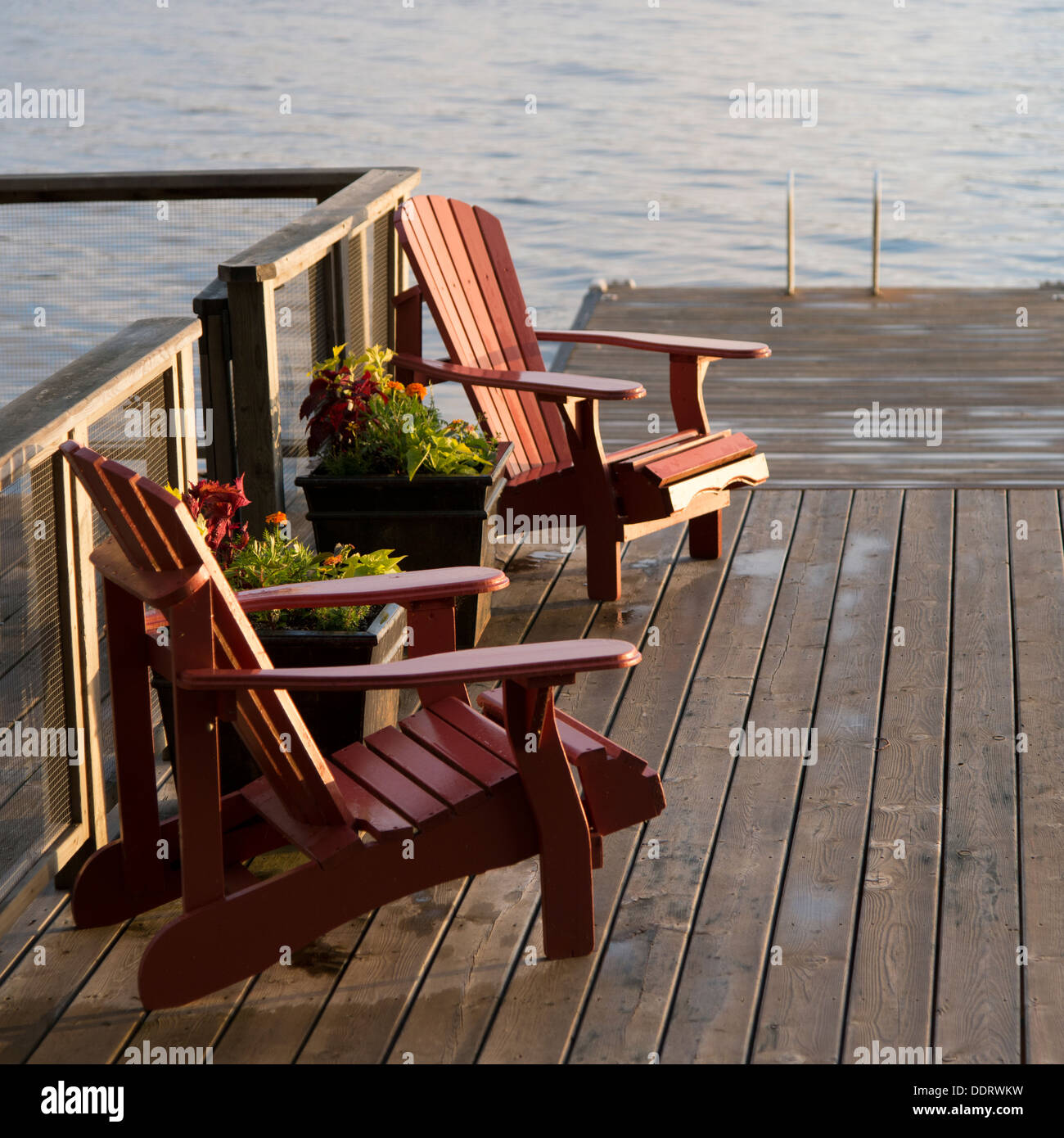 Adirondack Chair On Dock Stock Photos & Adirondack Chair On Dock Stock