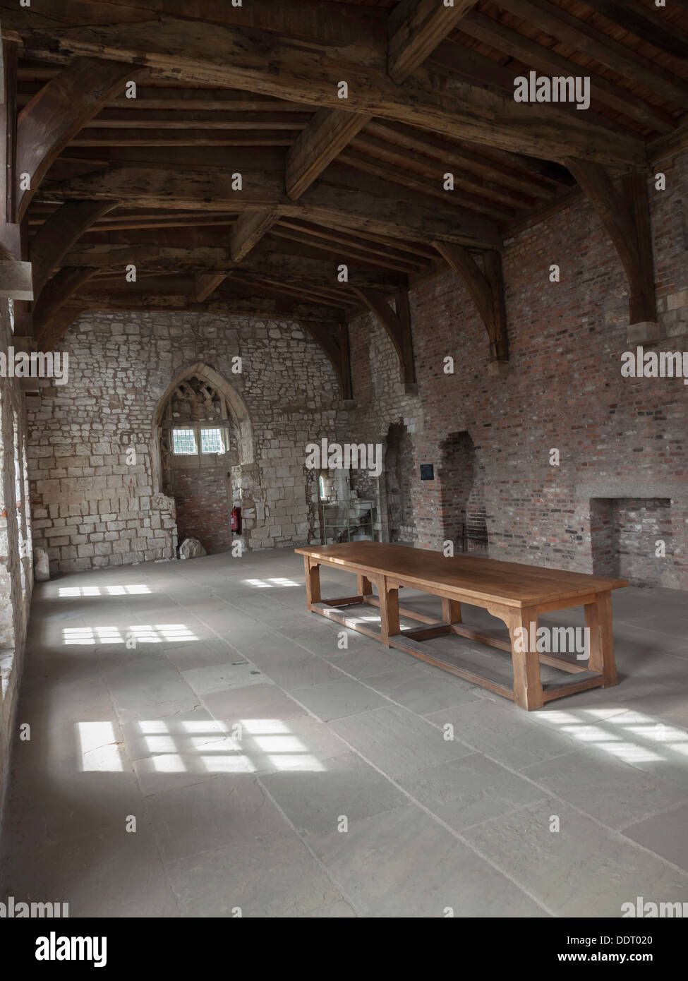 Burton Agnes Manor House 15th Century living room showing stone and brick walls and timber roof Stock Photo