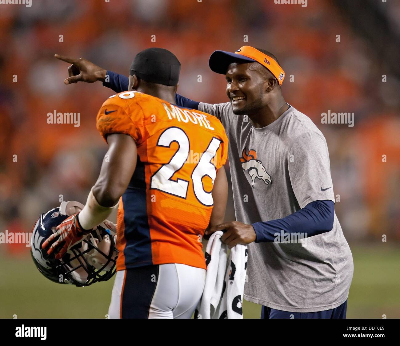 Denver, Colorado, USA. 5th Sep, 2013. Denver Broncos CB CHAMP BAILEY, right, gives direction to team mate RAHIM MOORE, left, during the 2nd. half at Sports Authority Field at Mile High Thursday night. The Broncos beat the Ravens 49-27. Credit:  Hector Acevedo/ZUMAPRESS.com/Alamy Live News Stock Photo