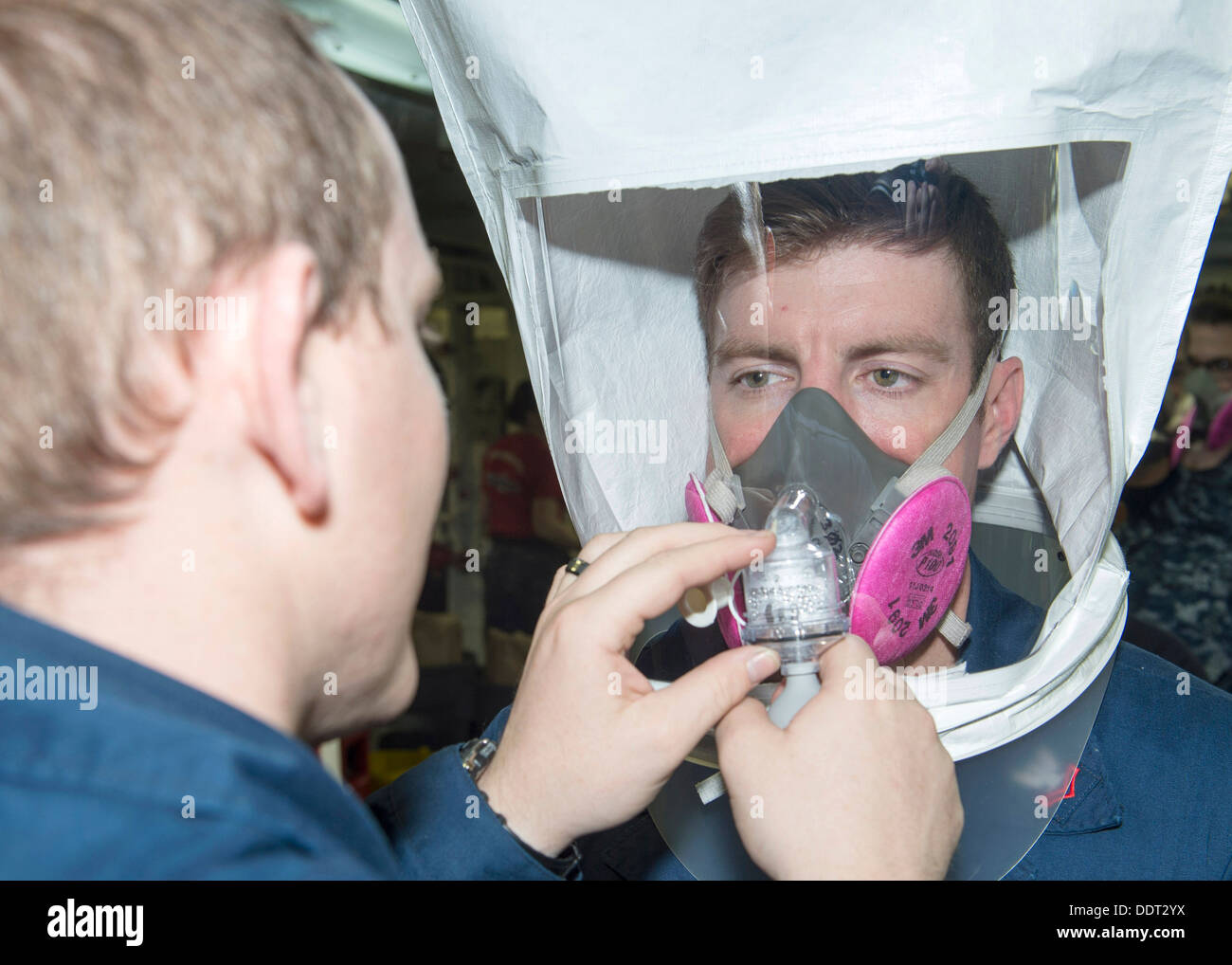 3M 6000 series respirator onboard forward-deployed amphibious assault ship USS Bonhomme Richard (LHD 6). Bonhomme Richard is the Stock Photo