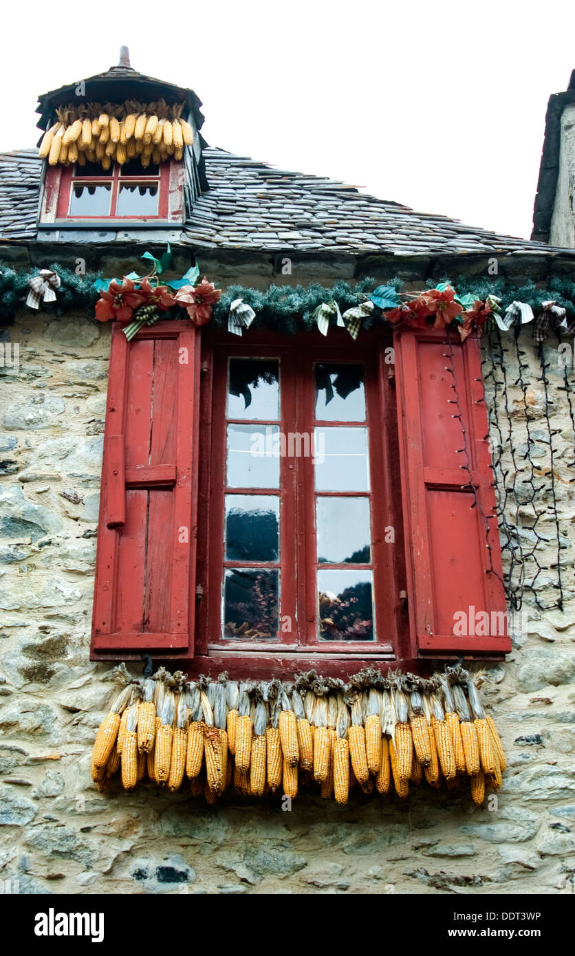 House front with corn. Stock Photo