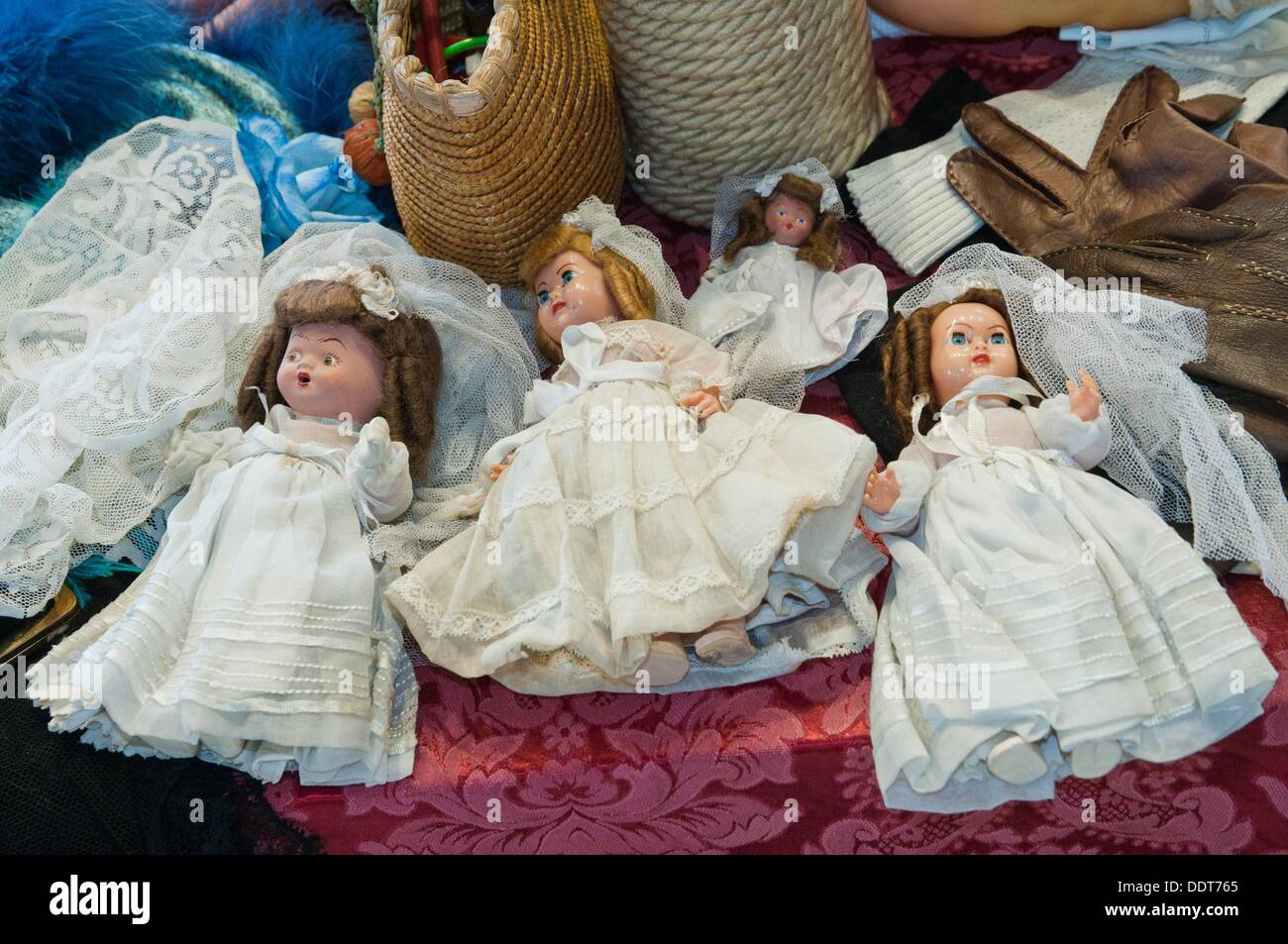 Vintage somewhat scary puppet toys at an antique shop, Spain Stock