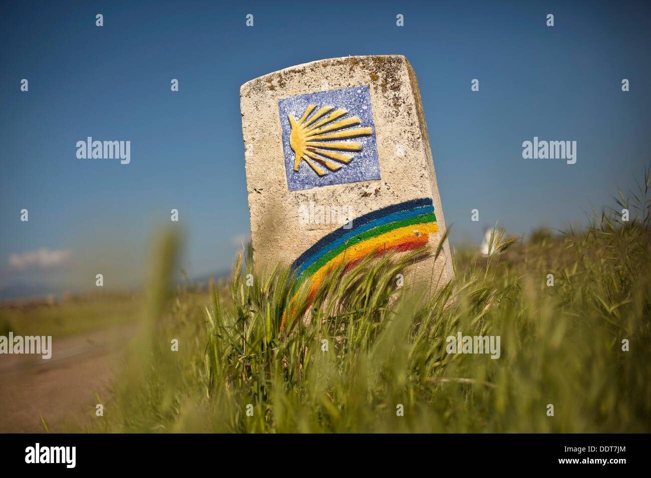 Marker with rainbow along the Camino de Santiago Stock Photo Alamy