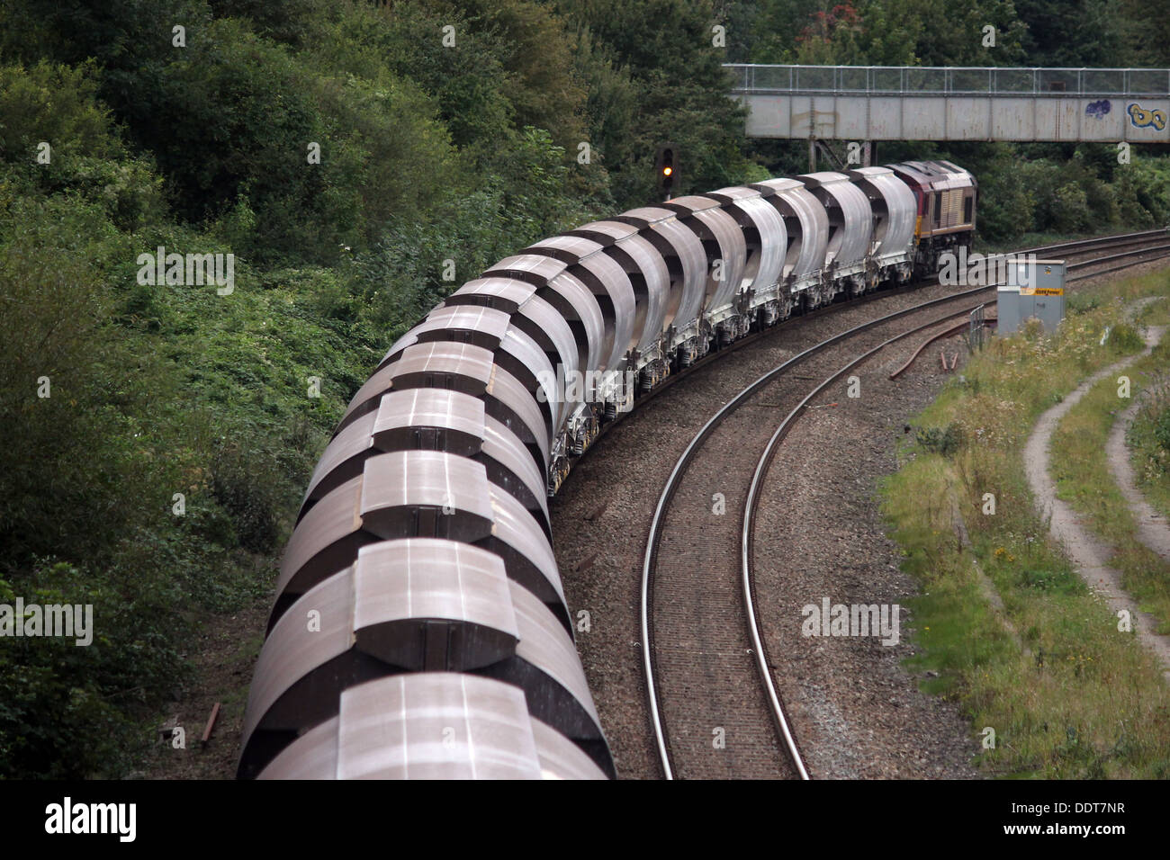 A freight train descends through Horfield in Bristol, UK Stock Photo
