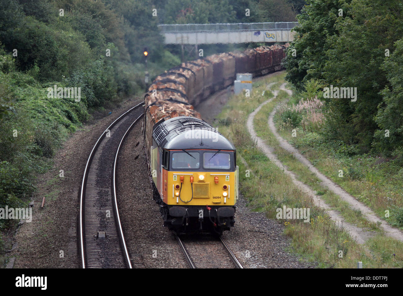 Class 56, 56094 climbs through Filton Bank, Bristol with a train load of timber. Stock Photo