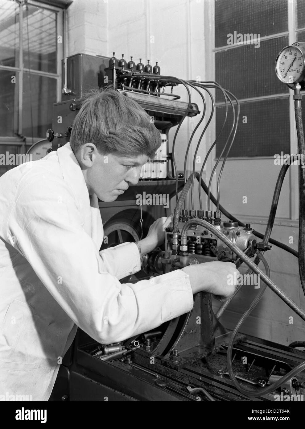 Apprentice at work, Globe & Simpson auto electrical Nottingham, Nottinghamshire, 1961