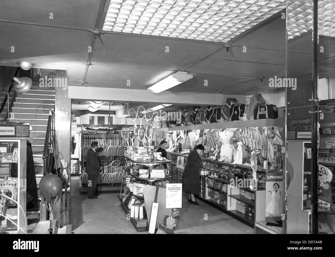 Customers in the Barnsley Co-op's sports department, South Yorkshire, 1957. Artist: Michael Walters Stock Photo
