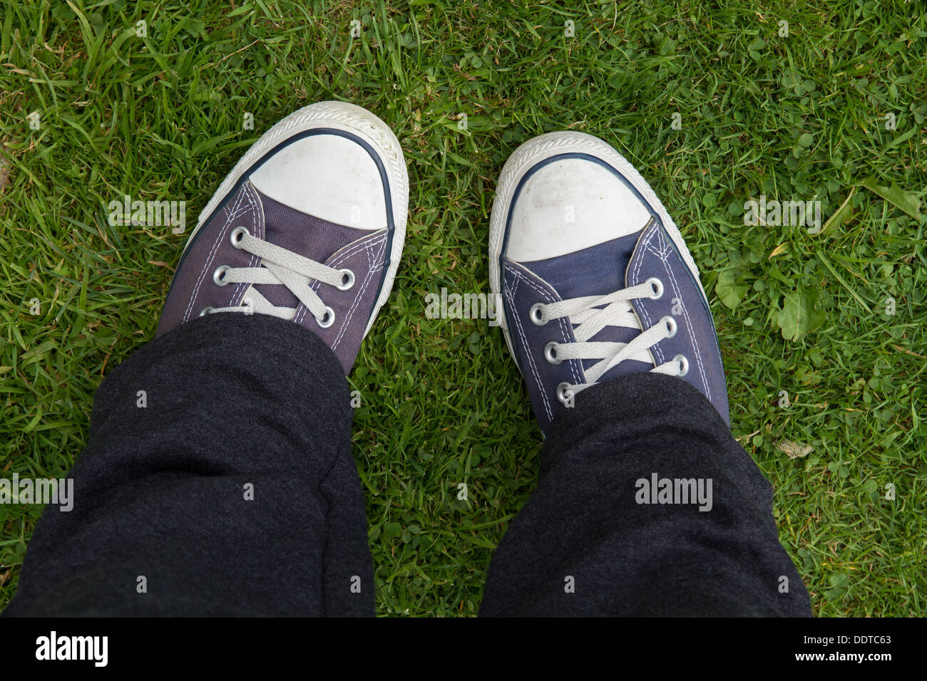 Feet in trainers Stock Photo