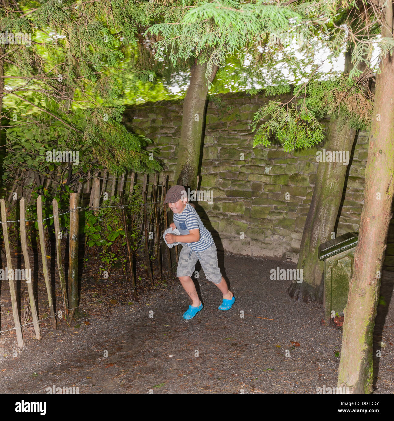 A 9 year old boy at The Forbidden Corner in Middleham , Leyburn , North Yorkshire , England , Britain , Uk Stock Photo