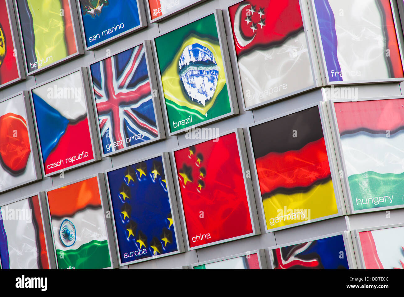 Sign at the entrance to Silverstone Racing Circuit with flags of the world. Stock Photo