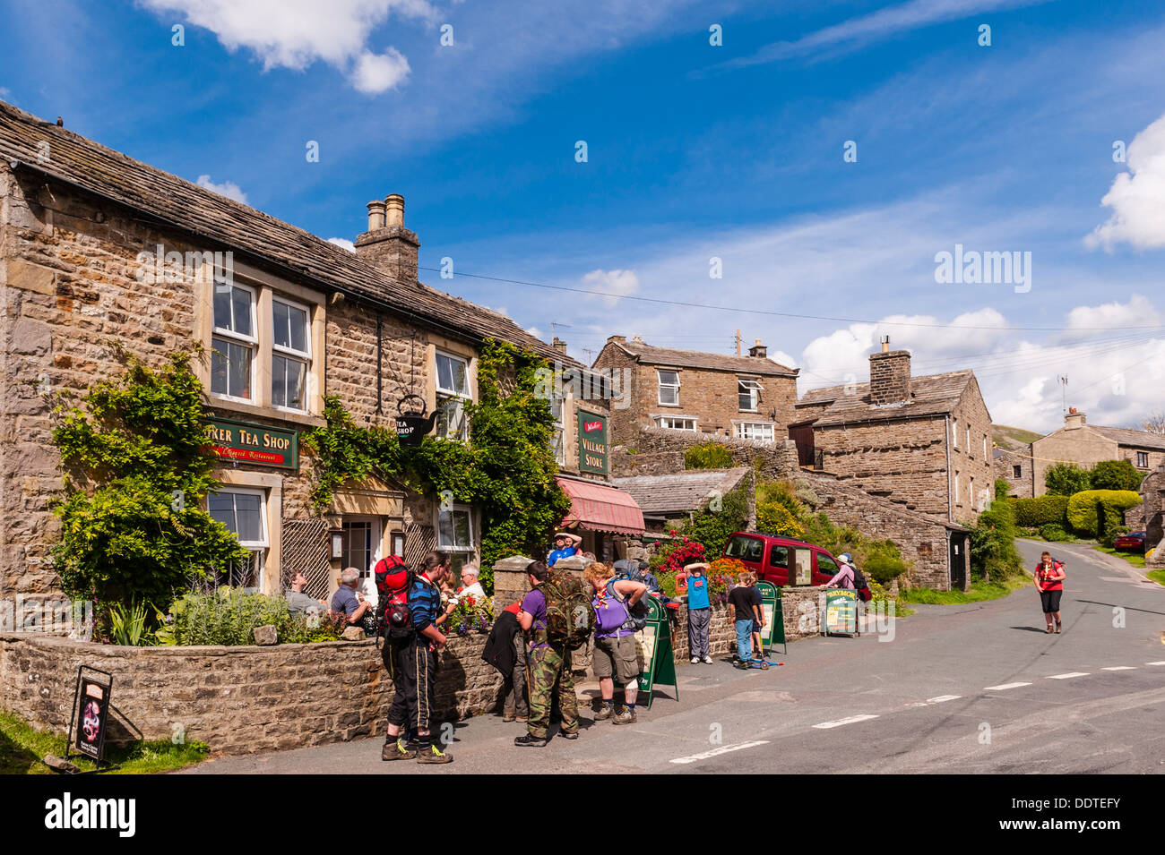 The Village Shop store and Tea shop with people outside at Muker in Swaledale , North Yorkshire , England, Britain, Uk Stock Photo