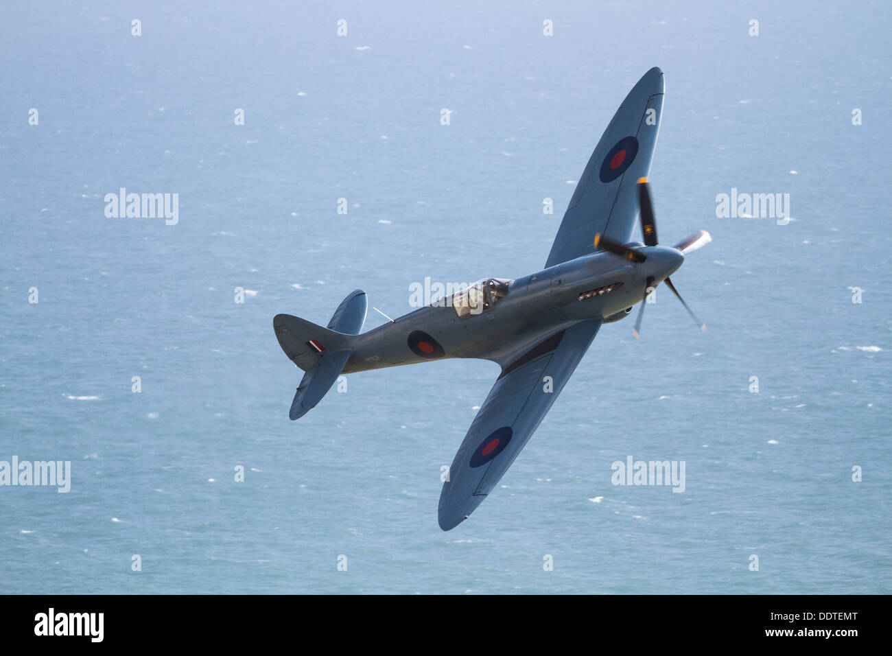 RAF Spitfire flying during the Airbourne aviation display in Eastbourne, Sussex UK Stock Photo
