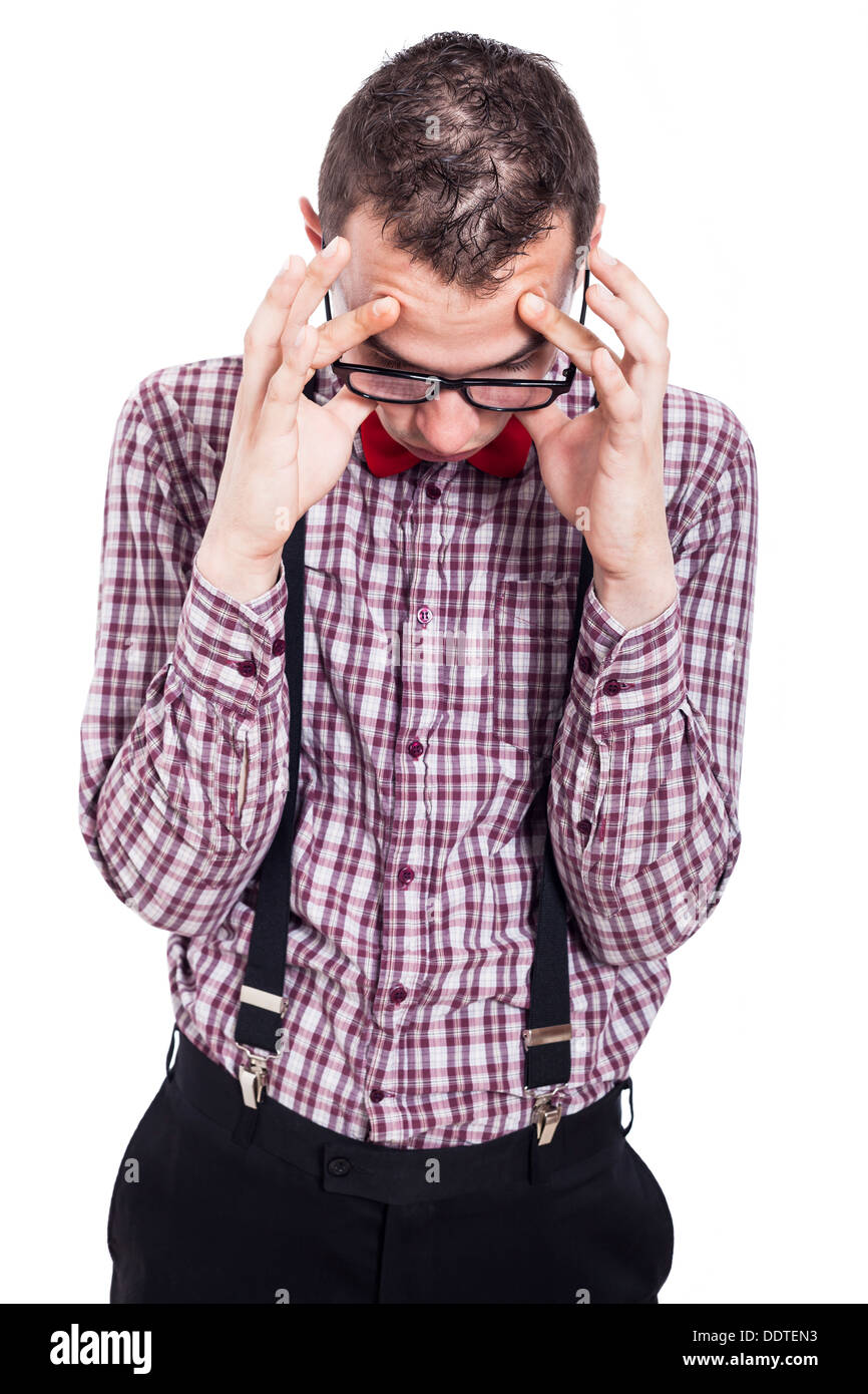 Portrait of unhappy nerd man with headache, isolated on white background Stock Photo